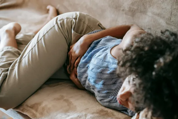 Abdominal pain indicating possible digestive or internal health issues